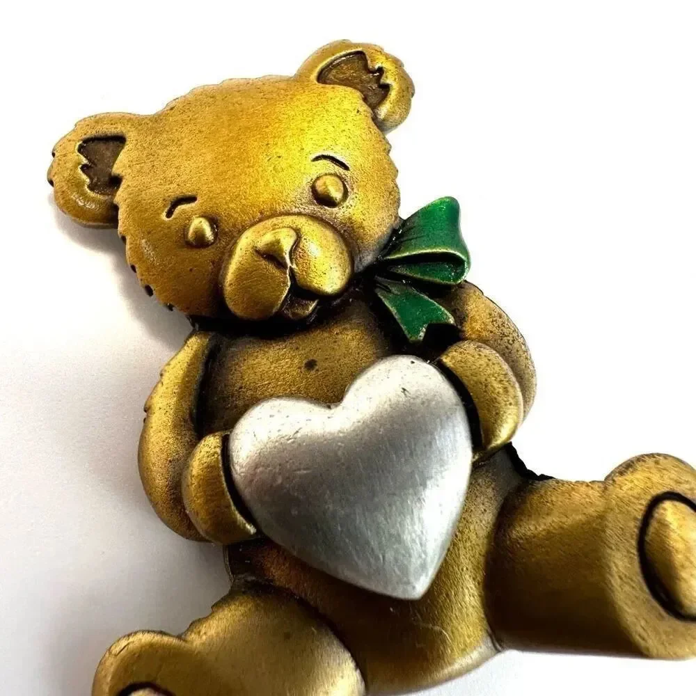 Jeanette Jewelry Gold and  Silver tone Bear holding a heart brooch